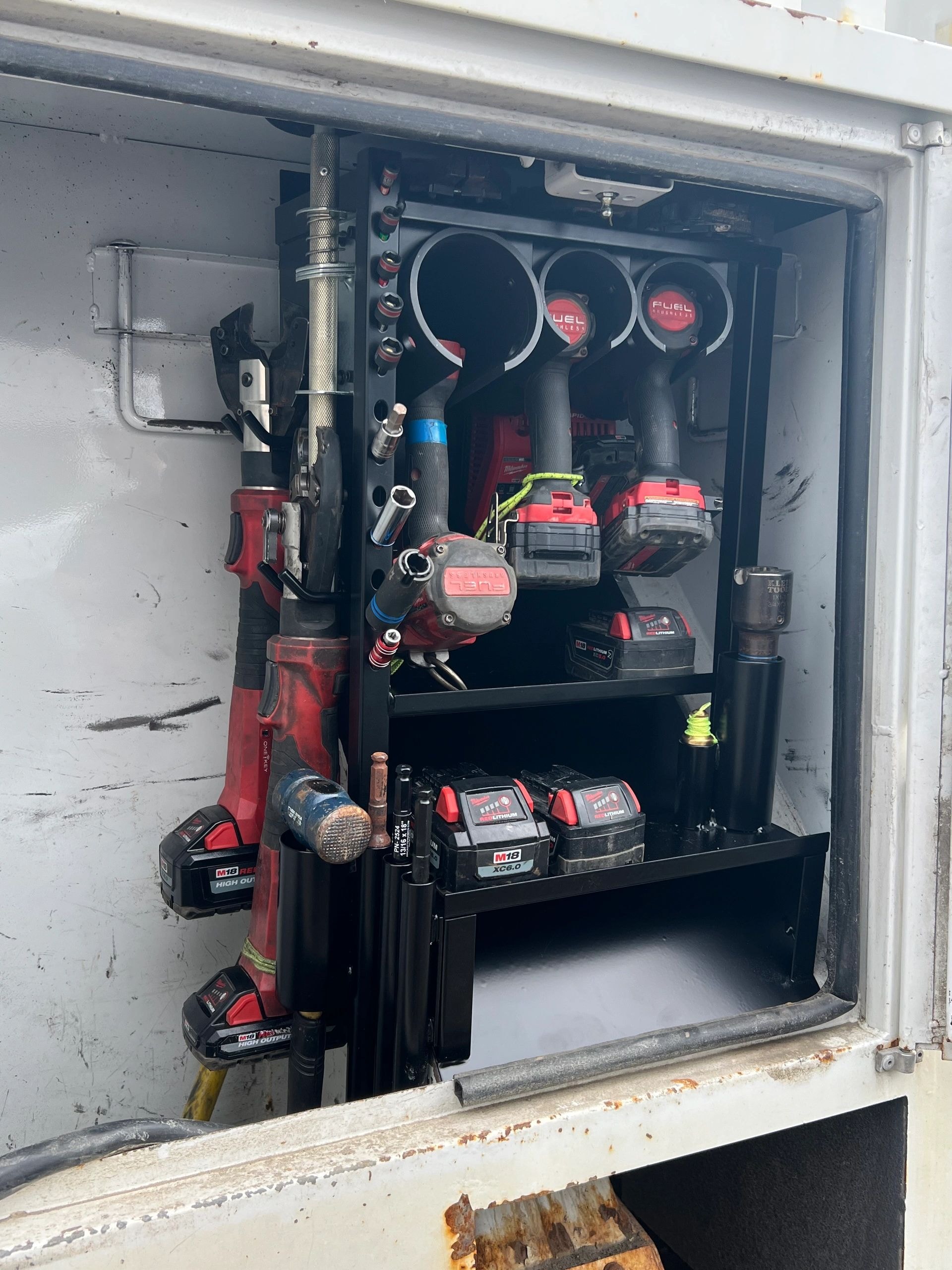 Organized tool storage cabinet on truck